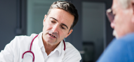 clinician talking to patient